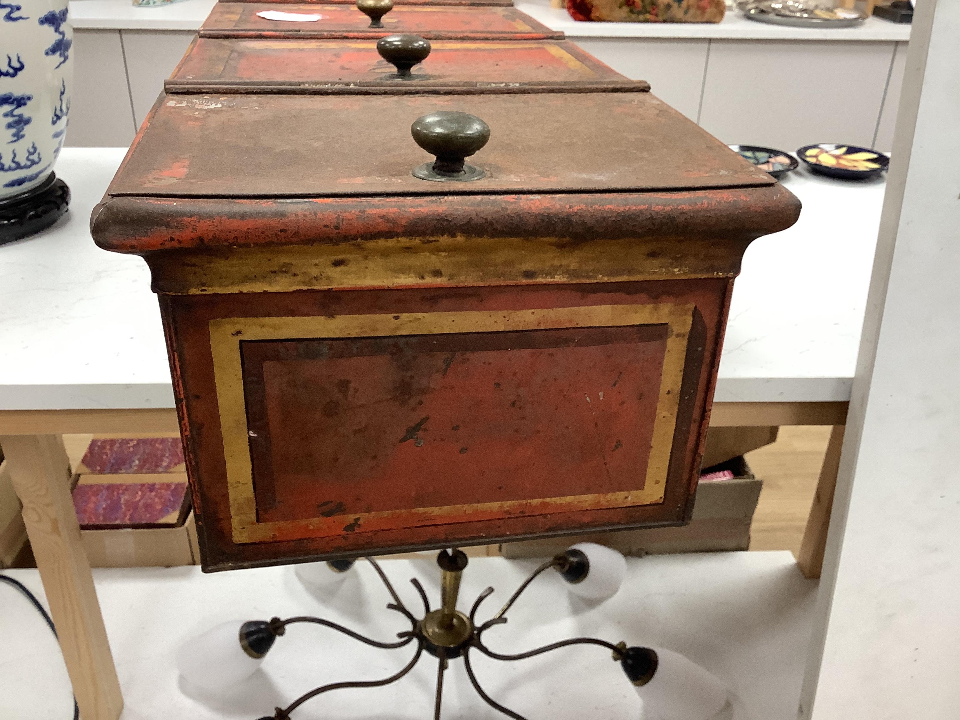 A Victorian painted retailer's advertising coffee tin with three compartments, 64cm wide